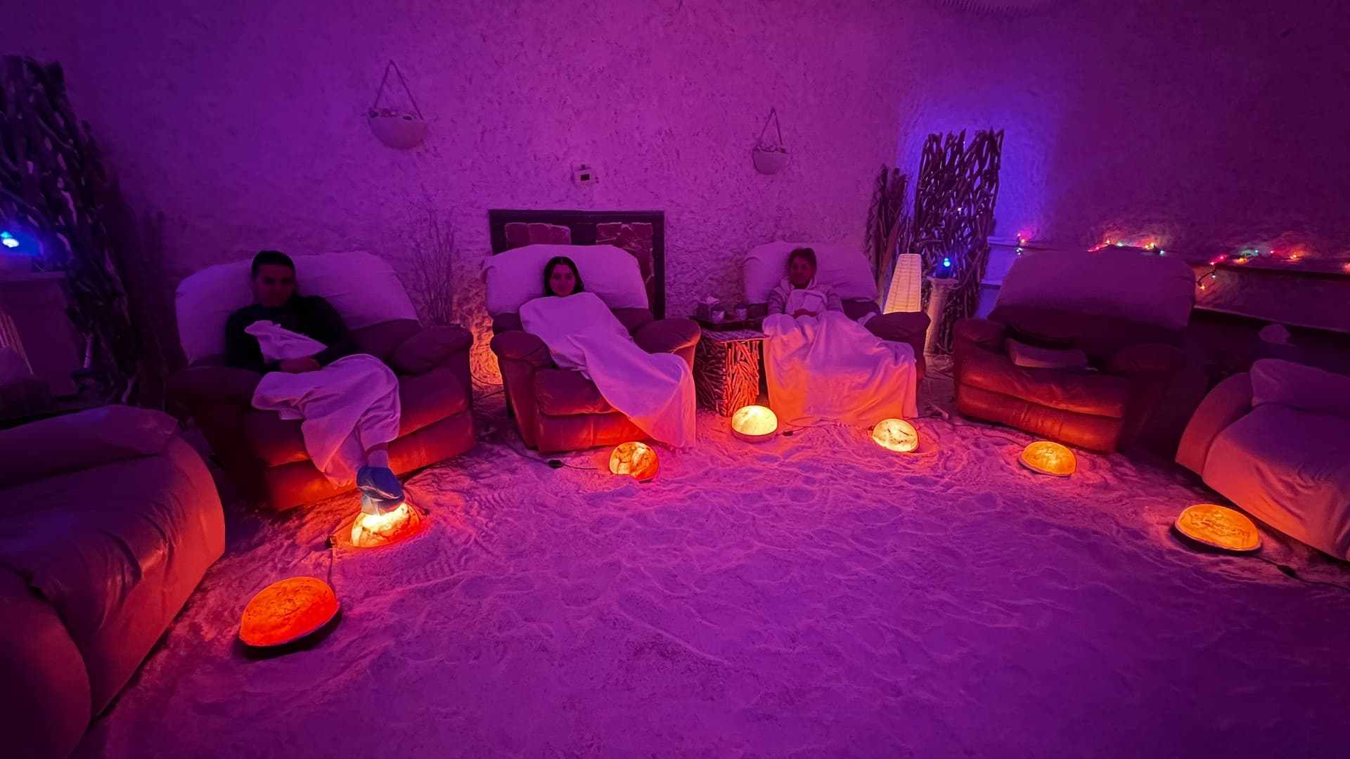 Salt room spa with relaxing purple ambient lighting
